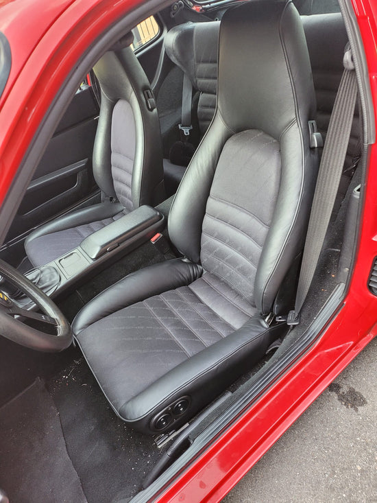 Schwarzes Glattleder, neue Polsterung